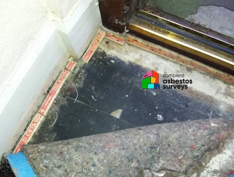 Asbestos containing floor tiles in domestic property hallway