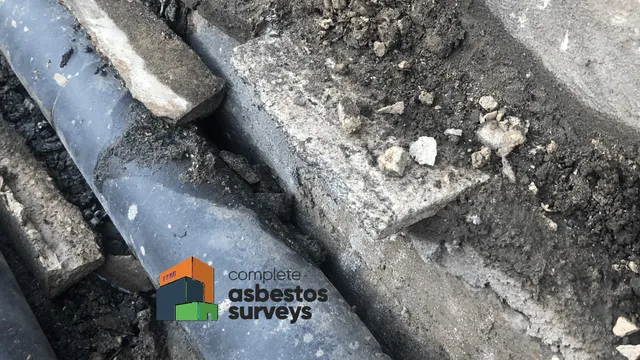 Asbestos Insulating Board Packer Within External Pipe Duct