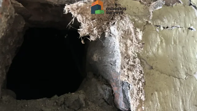 Asbestos Insulation on Wall Around Pipe Penetration