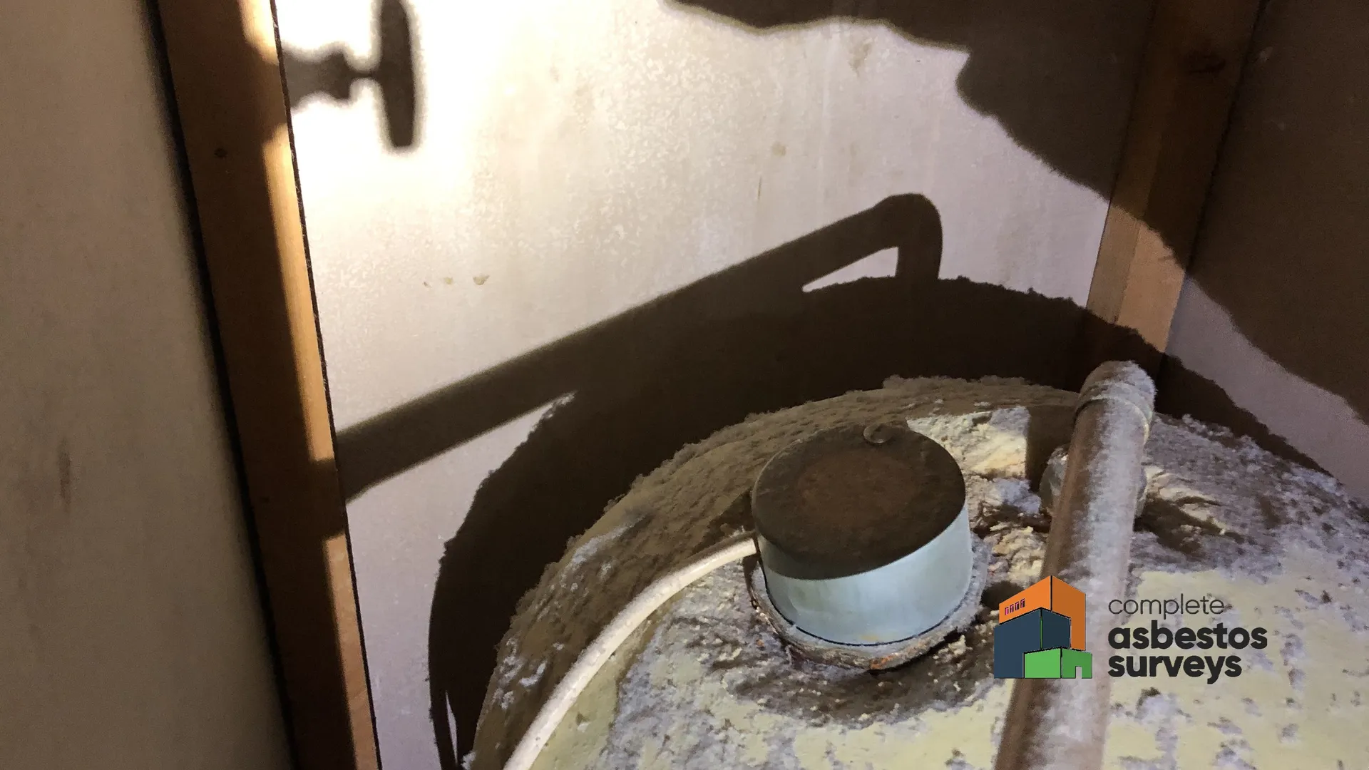 Asbestos Gasket to Heating Element on Top of Cylinder