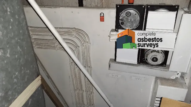 Asbestos Insulating Board Panel Behind Electrics