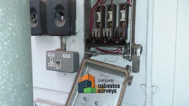 Asbestos Rope Seal Around Electrical Fuse Board
