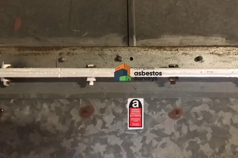 Encapsulation of asbestos rope seal on ducting