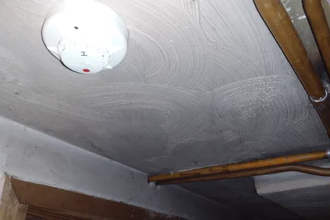 Textured coating to plaster