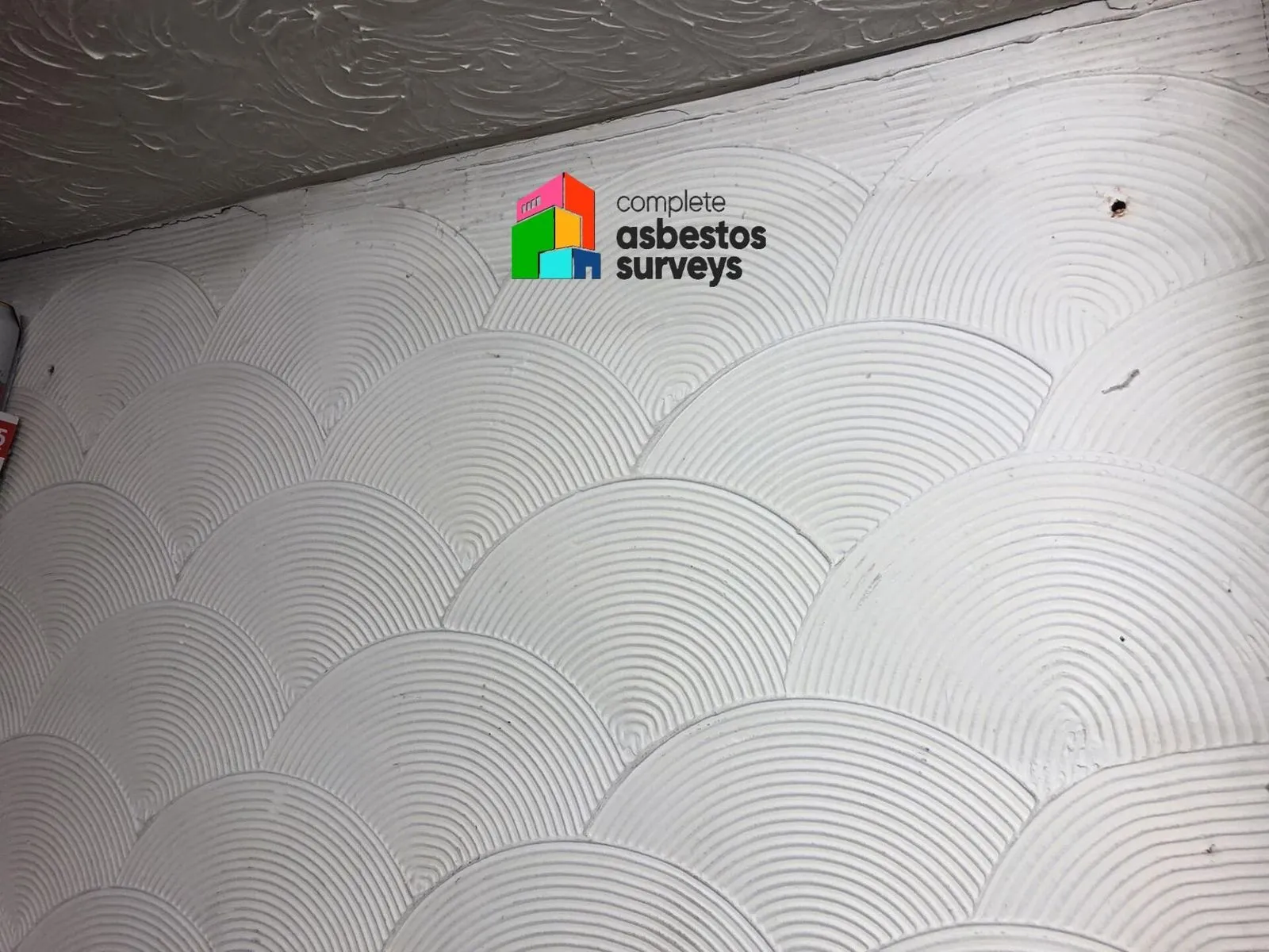 Asbestos textured coating to walls and ceiling in older domestic property