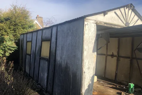 Asbestos cement garage roof Bradford before removal
