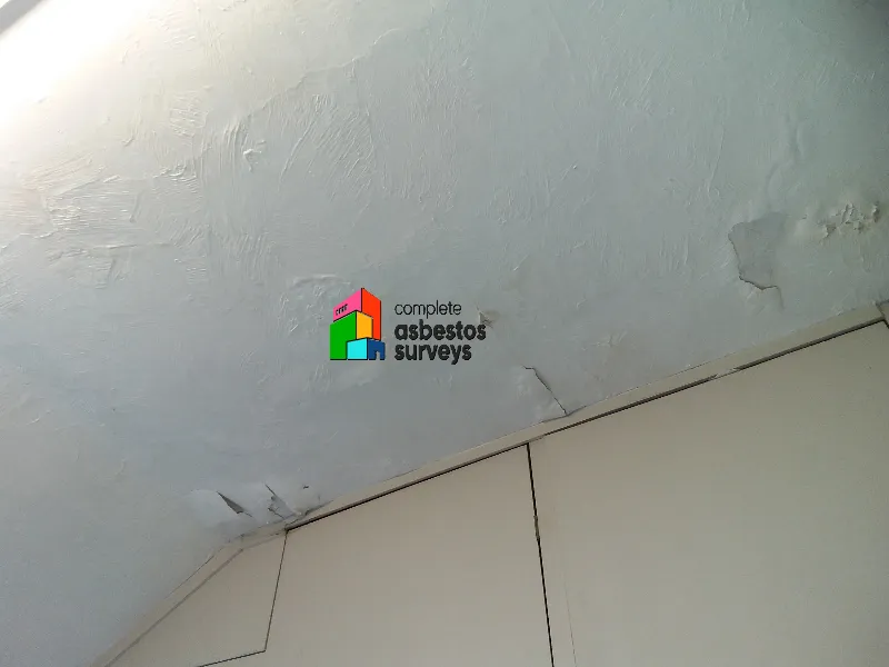 Asbestos Artex flaking away from ceiling or wall in older property