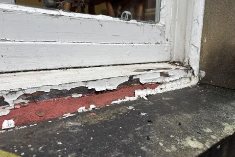 Asbestos window putty in home