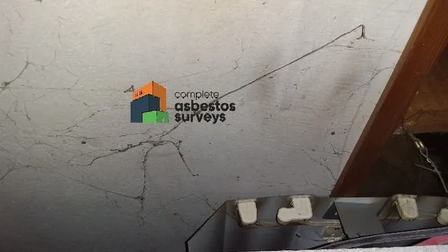 Asbestos Insulating Board Above Pub Ceiling