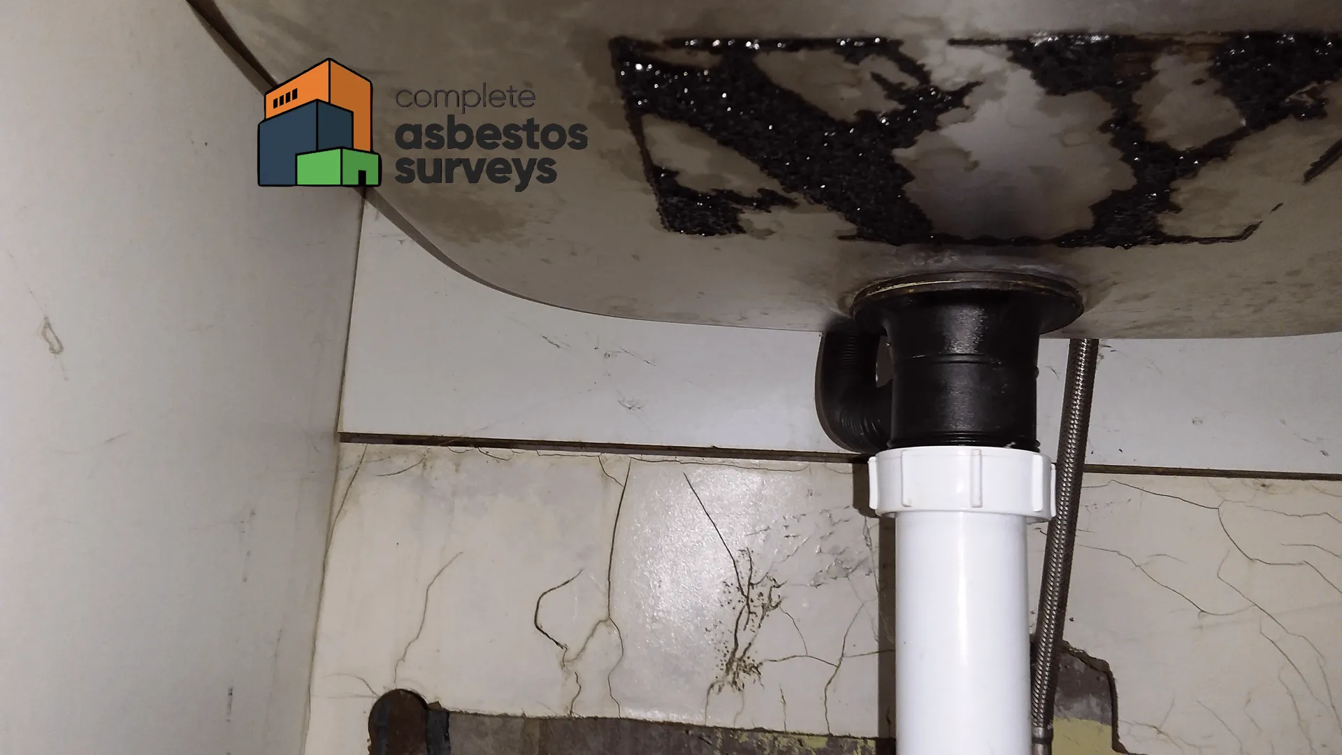 Damaged Asbestos Sink Pad