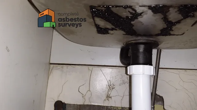 Damaged Asbestos Sink Pad