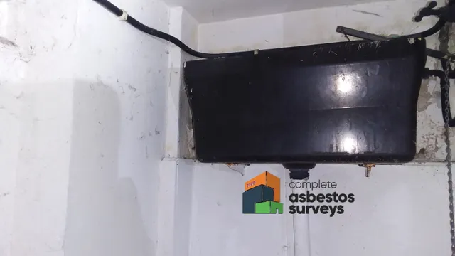 Asbestos Toilet Cistern in Office Toilet Block