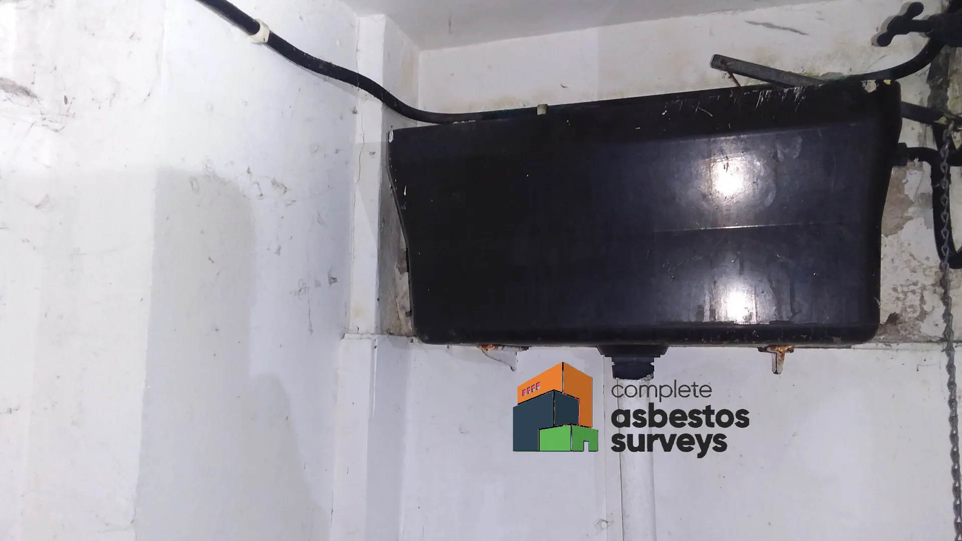 Asbestos Toilet Cistern in Office Toilet Block