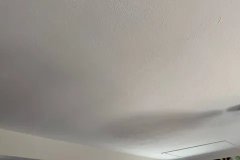 Textured Artex-style ceiling in the games room sampled as part of asbestos testing requested by a home buyer in York. The sample tested negative for asbestos.