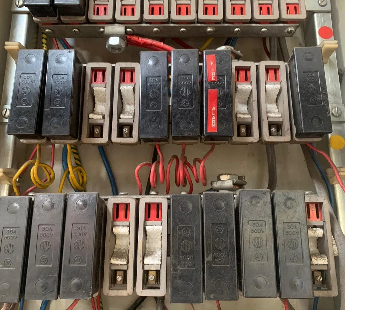 Asbestos Woven Fuse Guards in Large Electrical Boards