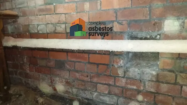 Asbestos Pipe Lagging on Pipe Under Floor of Church