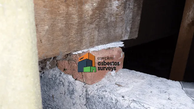 Asbestos Insulating Board Packer Within Loft