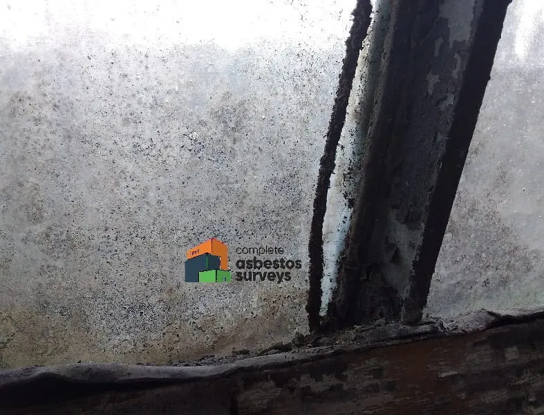 Asbestos Rope Seal Hanging Loose out of Window