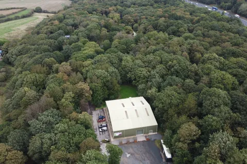 Aerial view showing part of the extensive 60-acre Bradley Wood site, where 16 buildings and 139 rooms and areas were surveyed for asbestos.