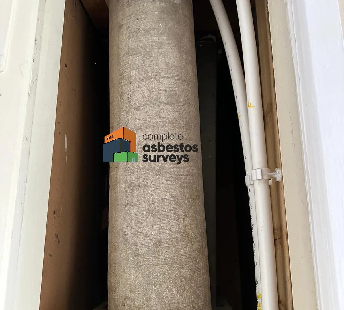 Asbestos Cement Flue Pipe in Boiler Cupboard