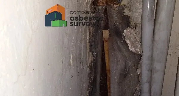 Asbestos Paper Used as a Vapour Barrier on Old Steam Pipes