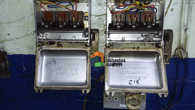 Asbestot Fuse Guards and Rope Seals to Redundant Fuse Boards in Old Factory