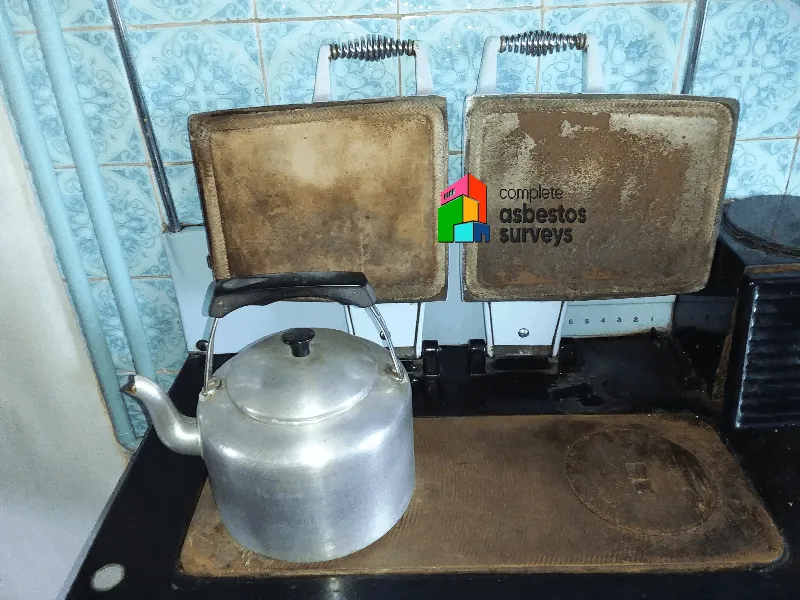 Asbestos Rope Seals Around Old Oven