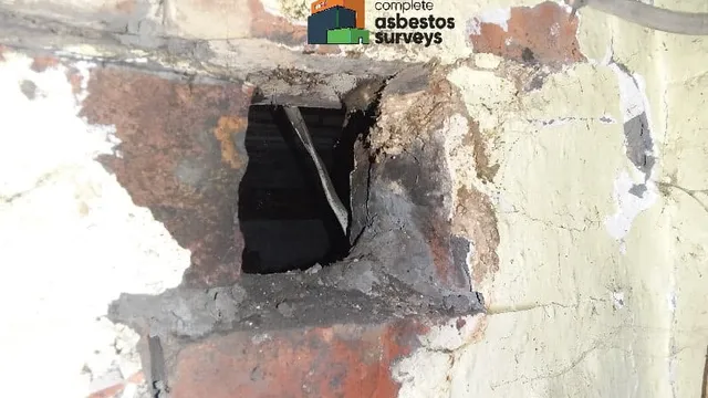 Asbestos Insulation Debris on Wall From Old Pipework