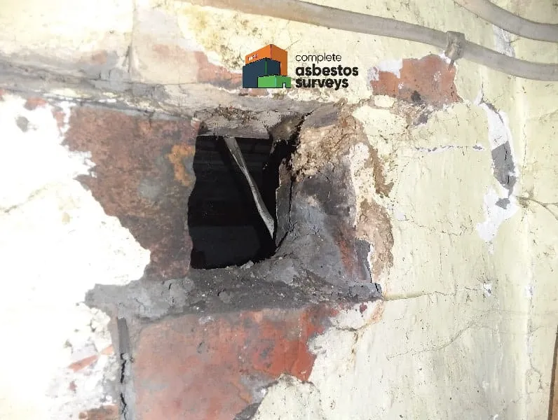 Asbestos Insulation Debris on Wall From Old Pipework