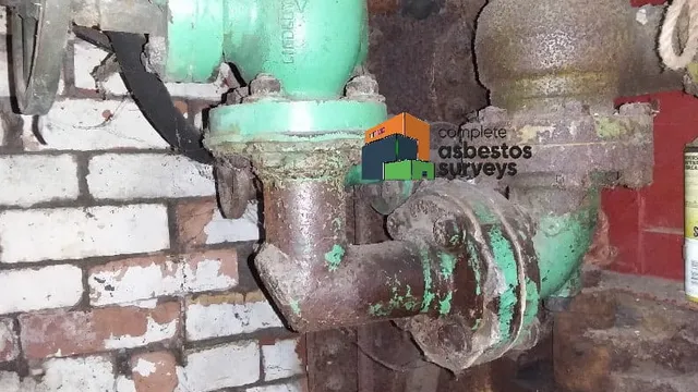 Asbestos Gasket to Pipe Flange in Boiler Room