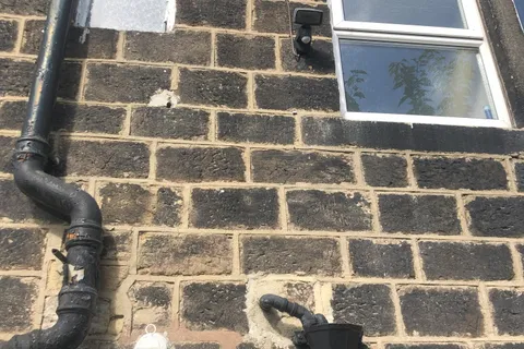 Domestic property after removal of asbestos flue pipe