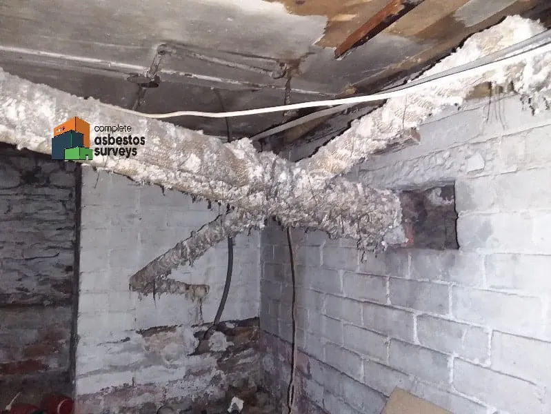 Asbestos Insulation Hanging From Pipework