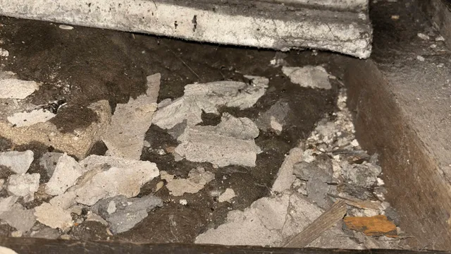 Asbestos Insulation Debris Within Loft