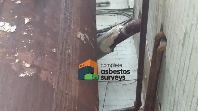 Asbestos Insulation Around Tank