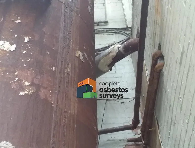 Asbestos Insulation Around Tank