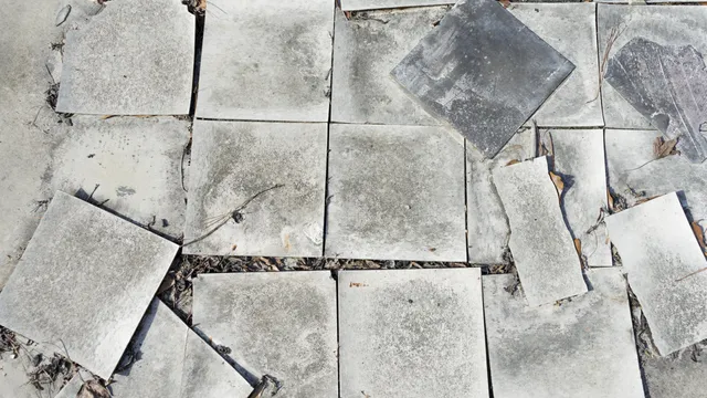 Damaged asbestos vinyl floor tiles