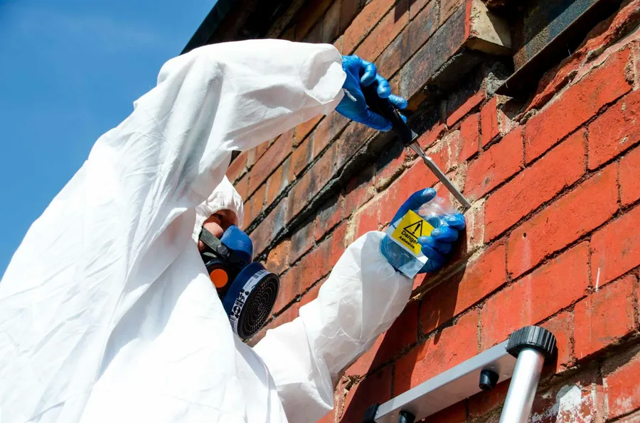 https://www.completeasbestossurveys.co.uk/wp-content/uploads/2023/03/Asbestos-testing-of-building-1920x1272.jpg