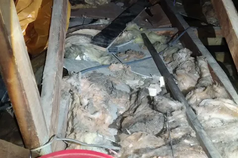 Asbestos cement debris in loft