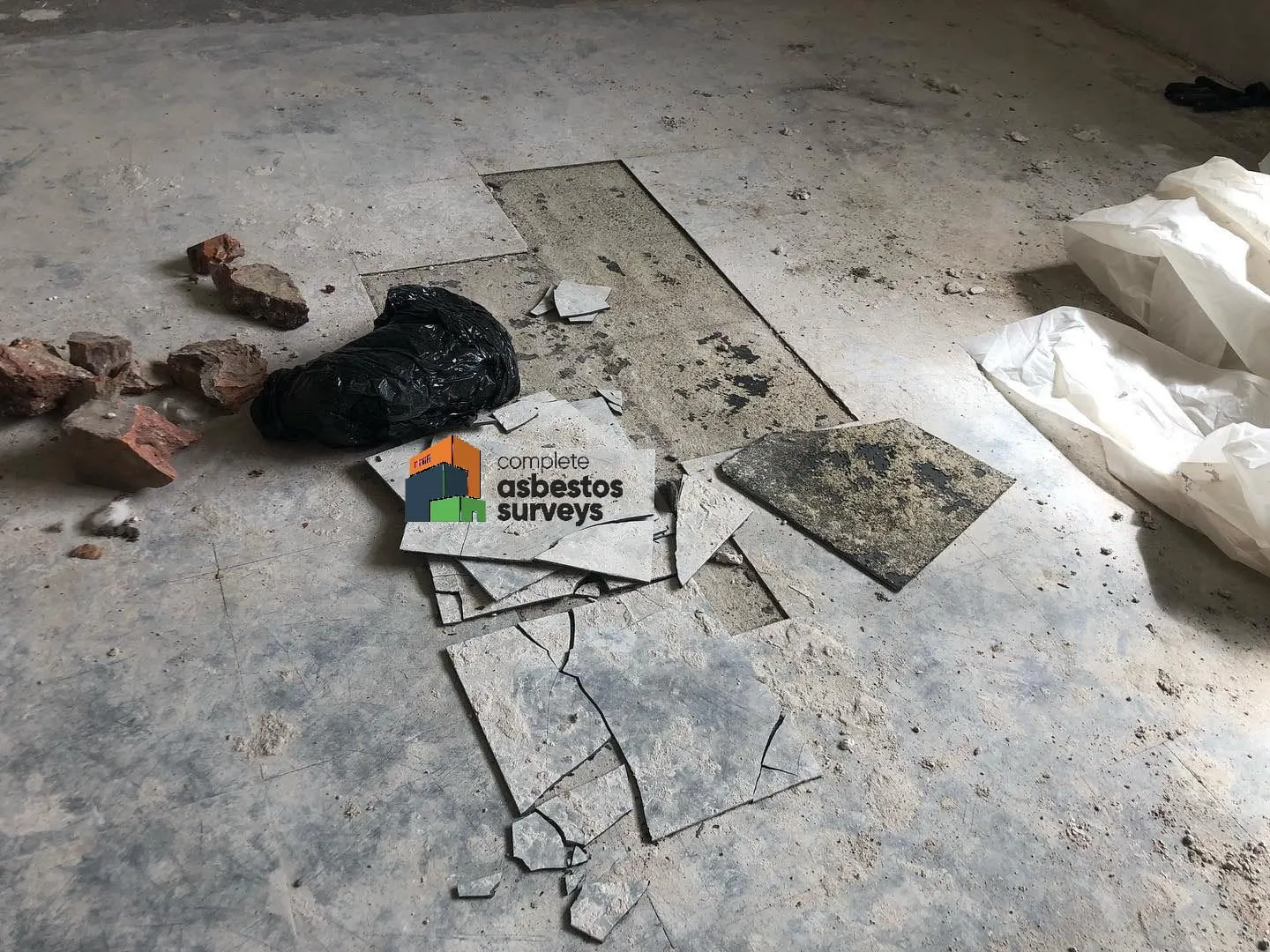 Damaged and Broken Asbestos Vinyl Floor Tiles
