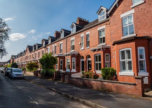 Street of red-brick Victorian terraced houses of the type commonly surveyed before purchase