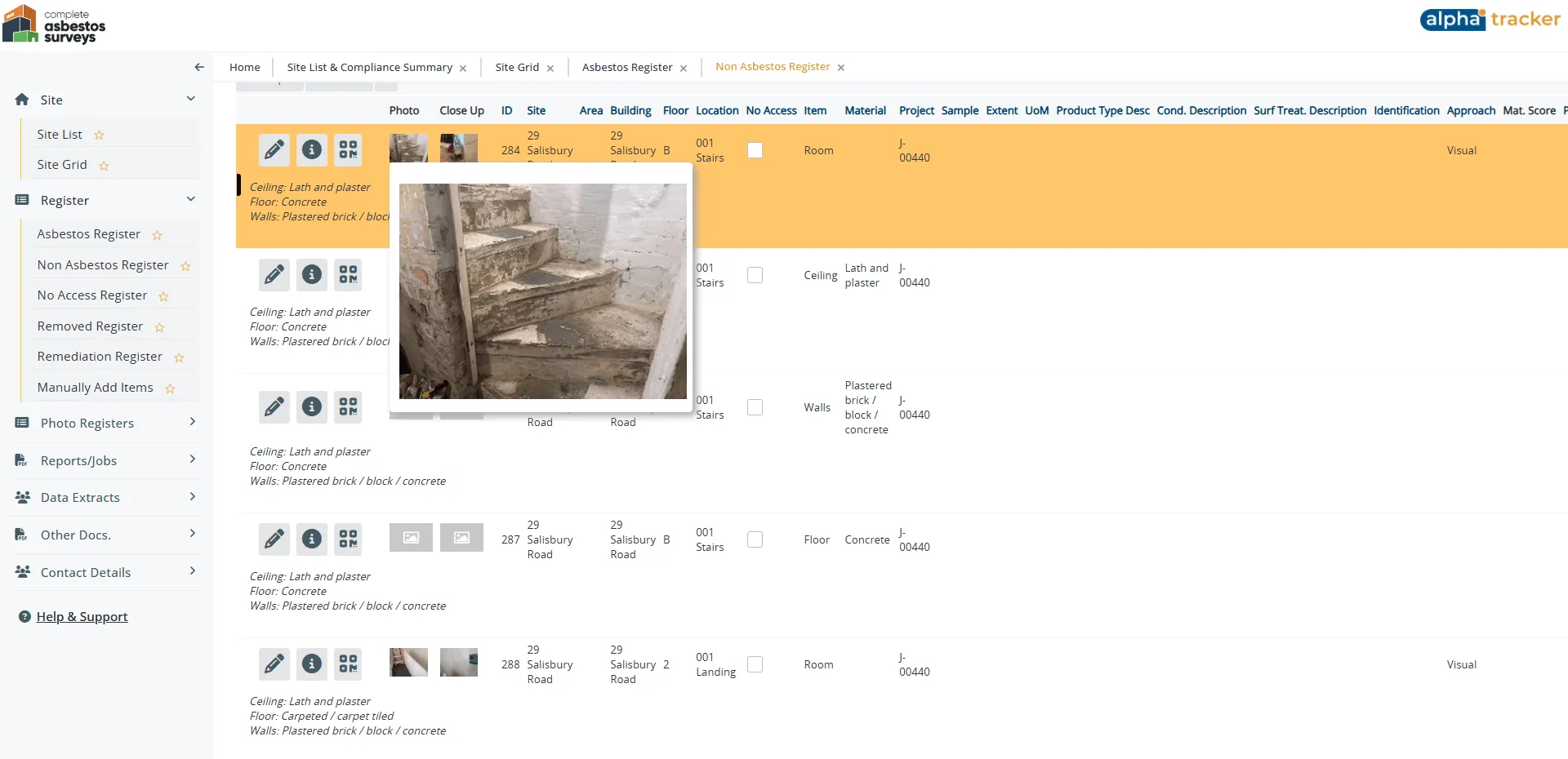 The live asbestos register in the portal, showing each material by site, floor and location with survey photographs