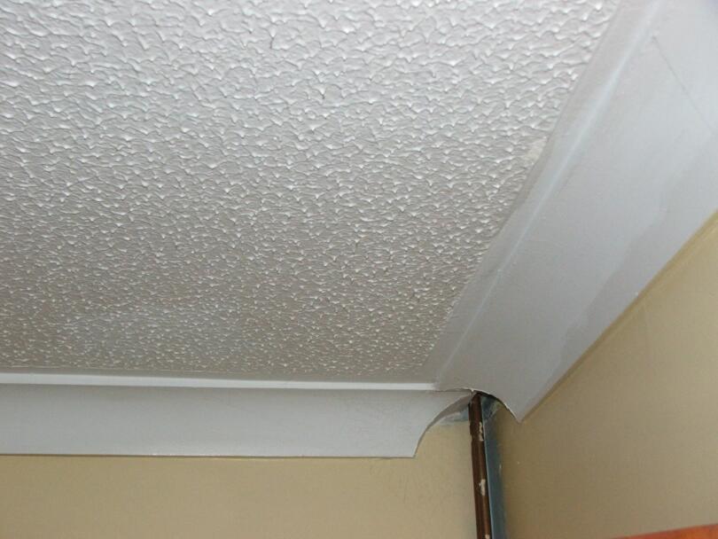 Asbestos artex ceiling up to coving