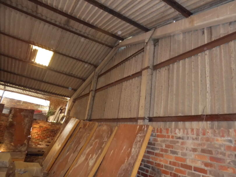 Asbestos cement roof and walls in farm barn building