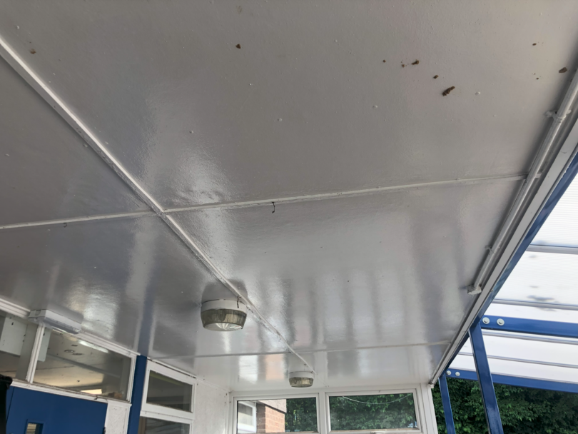 Asbestos cement canopy at school