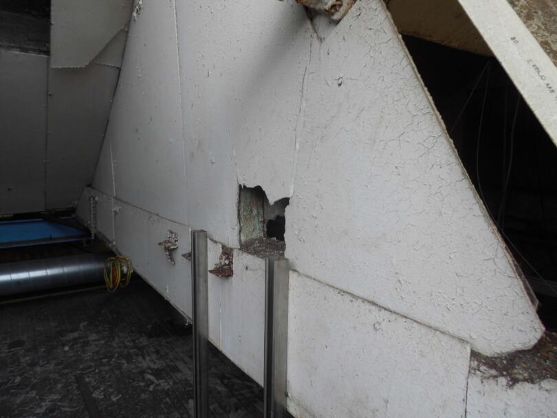 Asbestos cement fire break in loft area of industrial unit