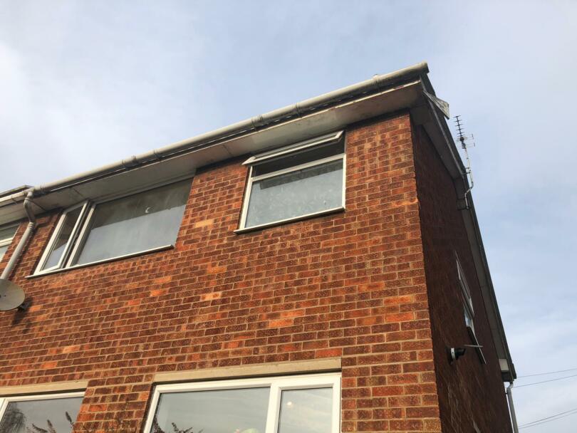 Asbestos cement soffits on semi detached house