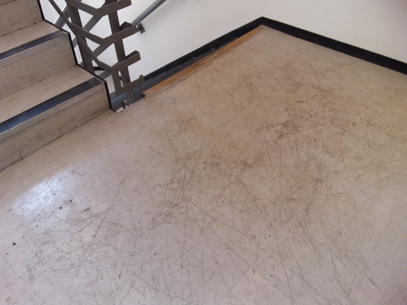 Asbestos floor tiles on stairwell