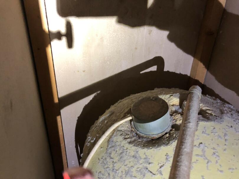 Asbestos gasket on hot water cylinder heating element in domestic property
