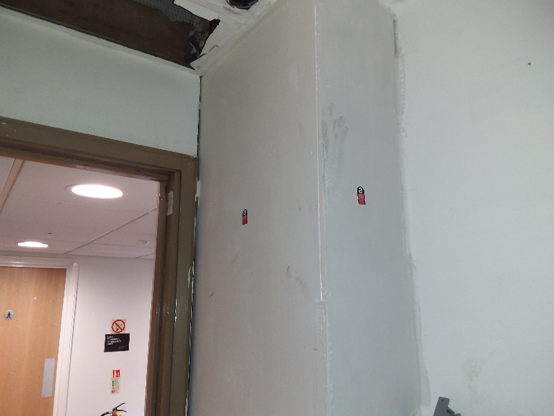 Asbestos insulating board painted and labelled