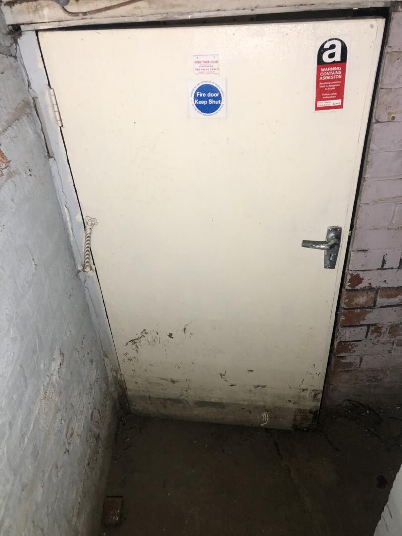 Aib lined fire door within boiler room